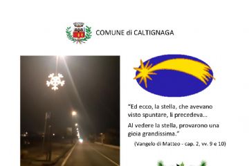 Foto luminarie strada statale, disegno stella cometa, riproduzione testo auguri